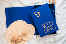 Heirloom Book with custom embossing stamp and matching clamshell album box.